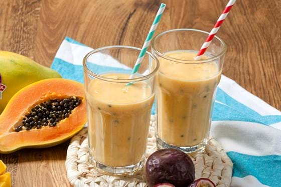 Passion fruit smoothie with mango and papaya